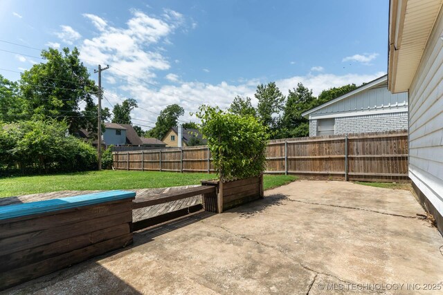 1632 E 55th Pl, Tulsa, OK 74105 - fenced backyard with a patio