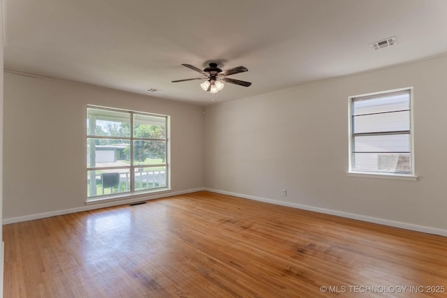 1632 E 55th Pl, Tulsa, OK 74105 - unfurnished room featuring a ceiling fan and light wood-type flooring