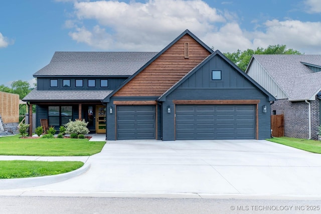 12926 S 20th Pl E, Jenks, OK 74037 - view of front of property featuring an attached garage, driveway, board and batten siding, and roof with shingles