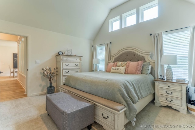 12926 S 20th Pl E, Jenks, OK 74037 - bedroom featuring light colored carpet and vaulted ceiling