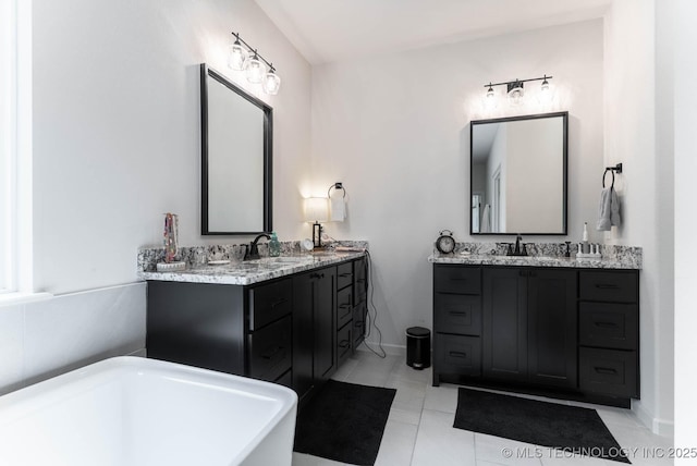 12926 S 20th Pl E, Jenks, OK 74037 - full bathroom featuring a soaking tub, double vanity, and tile patterned flooring