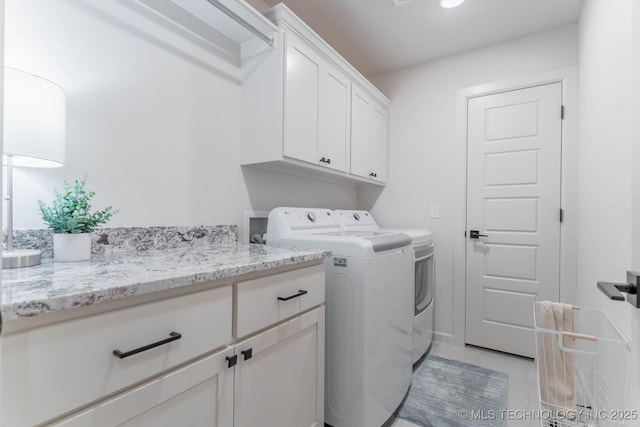12926 S 20th Pl E, Jenks, OK 74037 - washroom featuring cabinet space, washer and clothes dryer, and light tile patterned floors