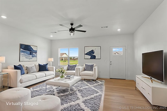 108 Michael, Calera, OK 74730 - living room with plenty of natural light, light wood-type flooring, recessed lighting, and ceiling fan