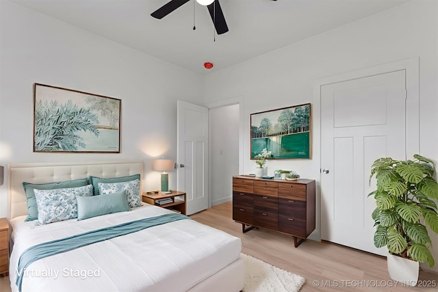 108 Michael, Calera, OK 74730 - bedroom with light wood-style flooring and a ceiling fan