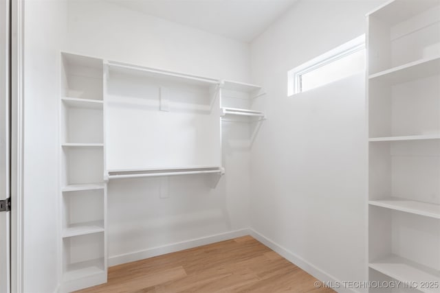 108 Michael, Calera, OK 74730 - spacious closet with wood finished floors