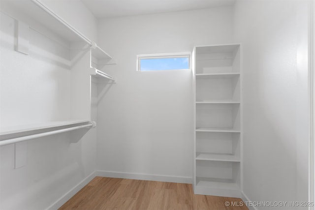 108 Michael, Calera, OK 74730 - spacious closet with wood finished floors