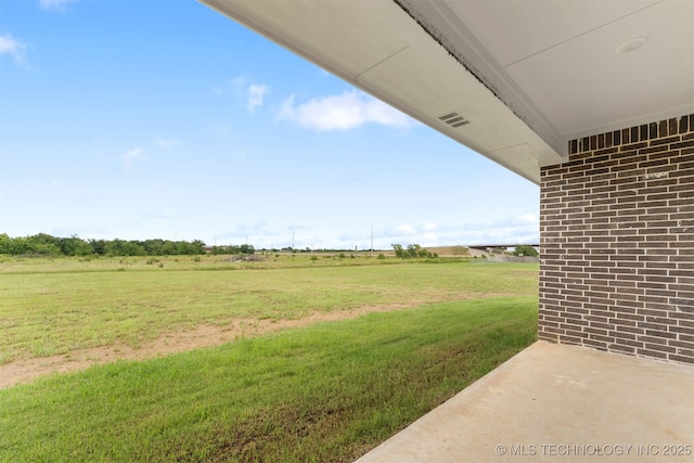 108 Michael, Calera, OK 74730 - view of grassy yard featuring a rural view