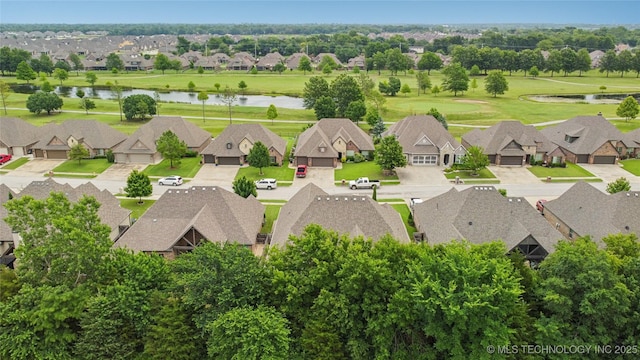 7722 N 142nd Ave E, Owasso, OK 74055 - aerial view of residential area featuring a large body of water
