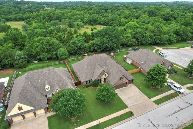 9312 N 93rd Ave E, Owasso, OK 74055 - view from above of property with a forest