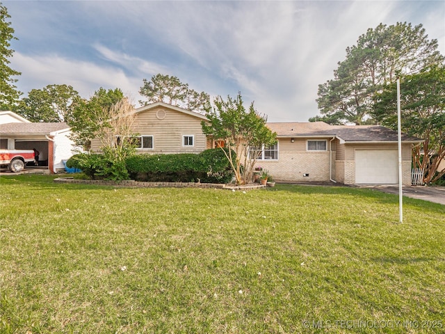 1508 E Seminole Ave, Mcalester, OK 74501 - view of front facade featuring an attached garage, brick siding, a front lawn, and driveway