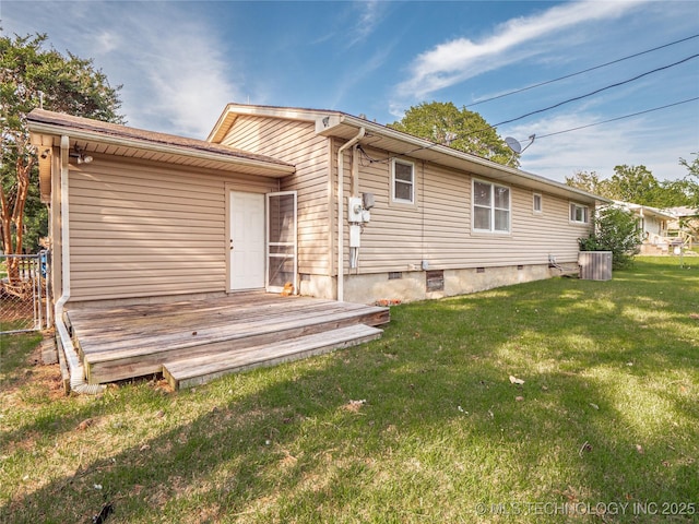1508 E Seminole Ave, Mcalester, OK 74501 - rear view of property featuring a lawn