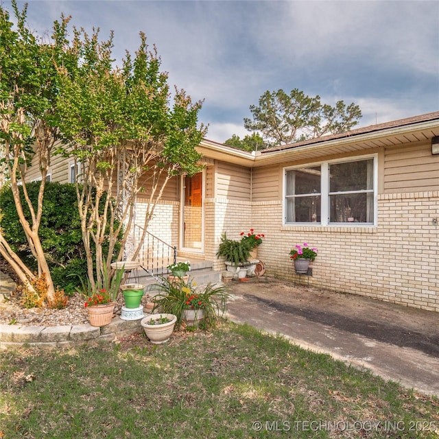 1508 E Seminole Ave, Mcalester, OK 74501 - view of front of house featuring brick siding