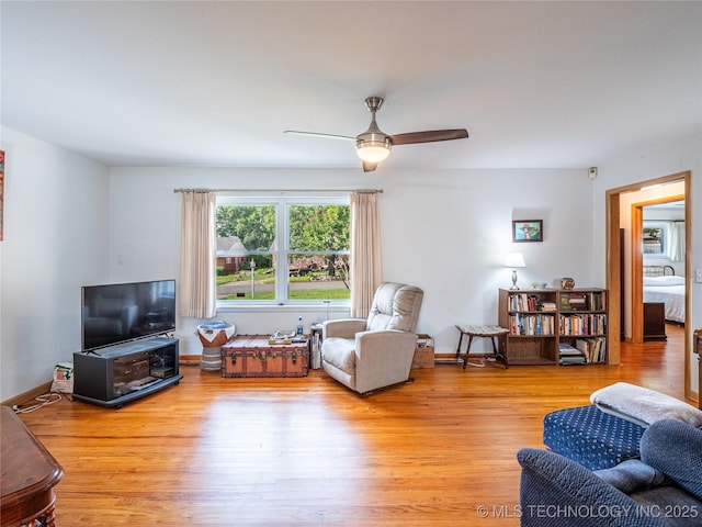 1508 E Seminole Ave, Mcalester, OK 74501 - living room with wood finished floors and ceiling fan