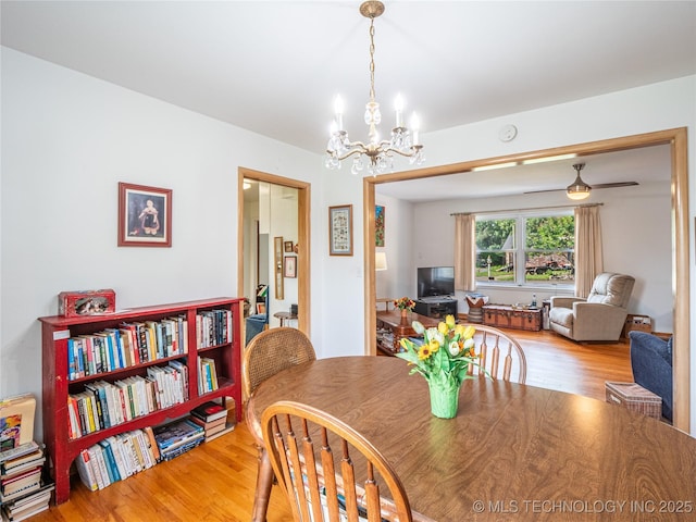 1508 E Seminole Ave, Mcalester, OK 74501 - dining area featuring a chandelier and wood finished floors
