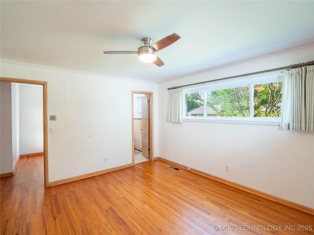 1508 E Seminole Ave, Mcalester, OK 74501 - spare room with ceiling fan and light wood-type flooring
