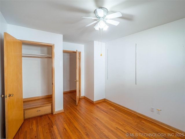 1508 E Seminole Ave, Mcalester, OK 74501 - unfurnished bedroom featuring wood finished floors, a closet, and ceiling fan