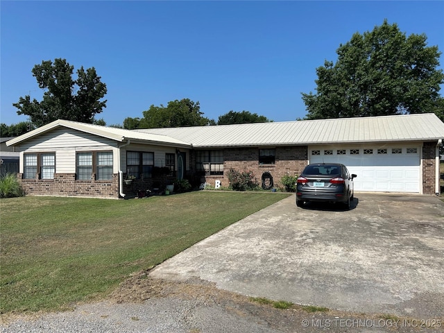 1203 NW 5th St, Stigler, OK 74462 - single story home featuring brick siding, a garage, concrete driveway, and a front lawn