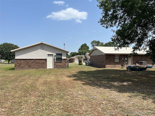 1203 NW 5th St, Stigler, OK 74462 - view of green lawn