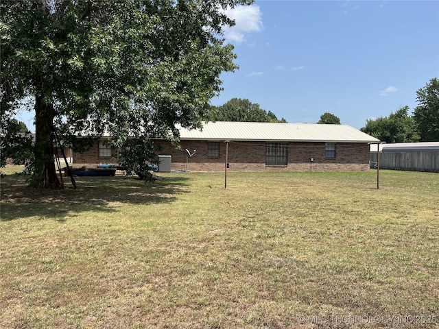 1203 NW 5th St, Stigler, OK 74462 - view of grassy yard