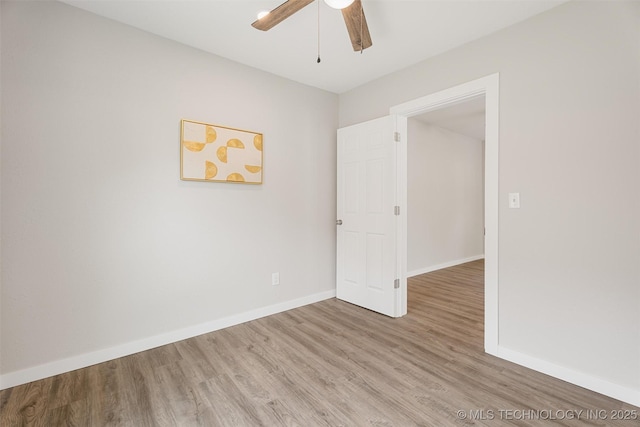 107 S Wyandotte Ave, Dewey, OK 74029 - spare room with wood finished floors and a ceiling fan