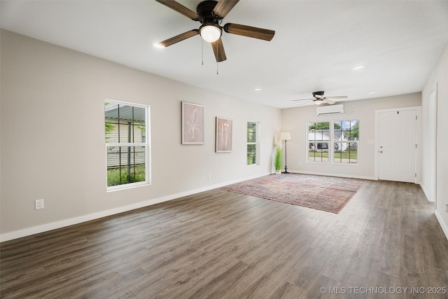 107 S Wyandotte Ave, Dewey, OK 74029 - empty room with ceiling fan, wood finished floors, recessed lighting, and a wall mounted air conditioner