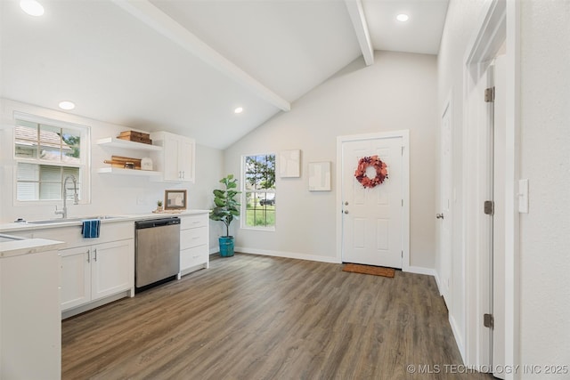 107 S Wyandotte Ave, Dewey, OK 74029 - kitchen with stainless steel dishwasher, beam ceiling, wood finished floors, white cabinetry, and open shelves