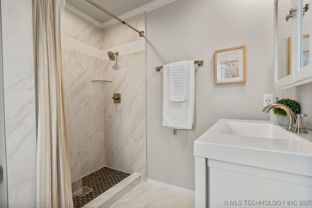 9703 S 100th E Ave, Tulsa, OK 74133 - bathroom with marble finish flooring, crown molding, tiled shower, and vanity