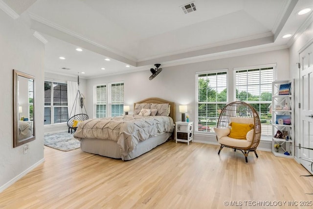 9703 S 100th E Ave, Tulsa, OK 74133 - bedroom with crown molding, light wood-type flooring, recessed lighting, and a tray ceiling