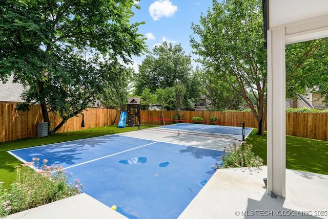 9703 S 100th E Ave, Tulsa, OK 74133 - view of basketball court featuring a playground and a fenced backyard