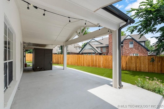 9703 S 100th E Ave, Tulsa, OK 74133 - fenced backyard with a patio area