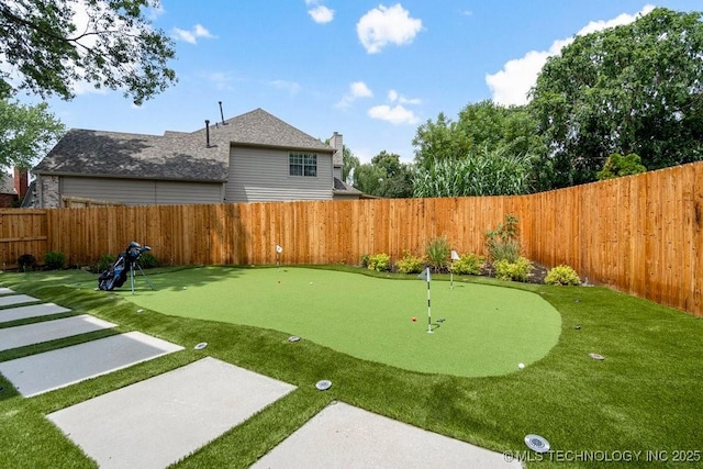 9703 S 100th E Ave, Tulsa, OK 74133 - fenced backyard featuring a putting area