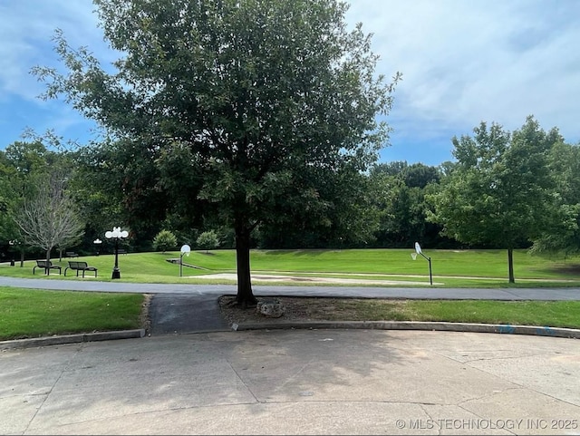 9703 S 100th E Ave, Tulsa, OK 74133 - view of property's community with a lawn