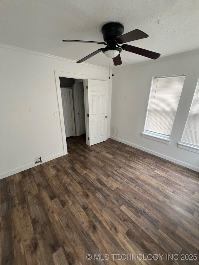 839 N New Haven Ave, Tulsa, OK 74115 - unfurnished bedroom with ornamental molding, dark wood finished floors, a textured ceiling, and a ceiling fan
