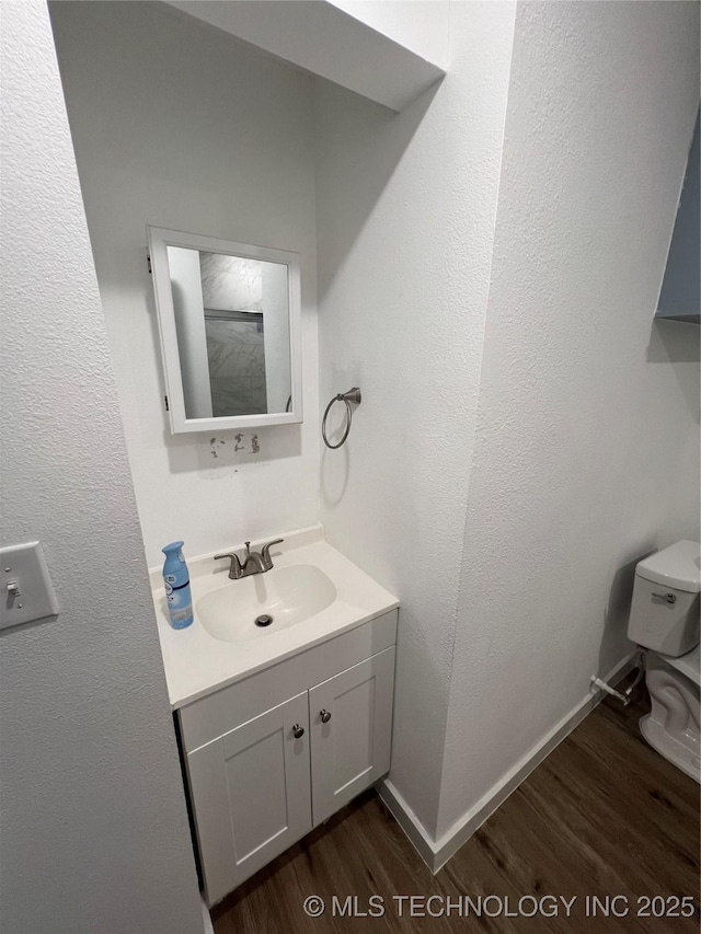 839 N New Haven Ave, Tulsa, OK 74115 - bathroom with wood finished floors and vanity