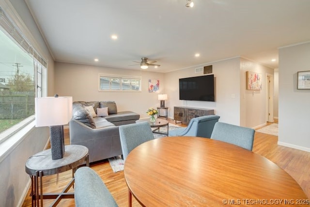 2441 S Norwood Ave, Tulsa, OK 74114 - dining room featuring light wood-type flooring, ceiling fan, and recessed lighting