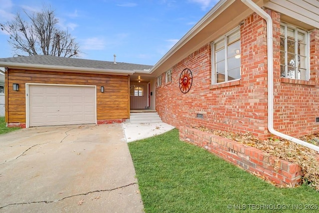 2441 S Norwood Ave, Tulsa, OK 74114 - view of front of property with concrete driveway, a garage, brick siding, crawl space, and a shingled roof