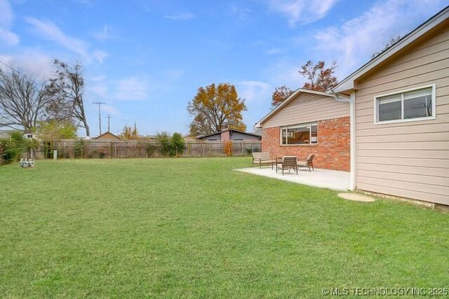 2441 S Norwood Ave, Tulsa, OK 74114 - view of yard featuring a patio