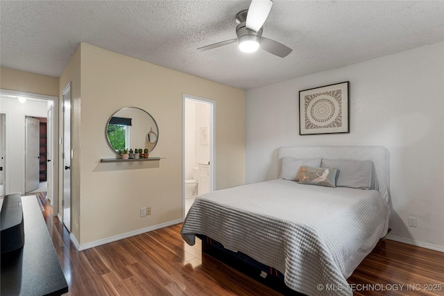 4504 S Cedar Ave, Broken Arrow, OK 74011 - bedroom with wood finished floors, a textured ceiling, connected bathroom, and a ceiling fan