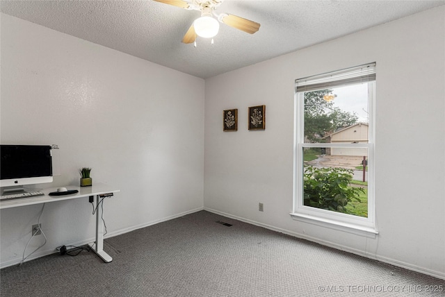 4504 S Cedar Ave, Broken Arrow, OK 74011 - unfurnished office featuring carpet floors, ceiling fan, and a textured ceiling