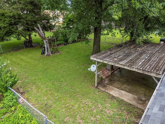 4504 S Cedar Ave, Broken Arrow, OK 74011 - view of yard featuring a wooden deck