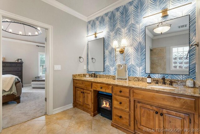 9402 E 109th St S, Tulsa, OK 74133 - ensuite bathroom featuring ornamental molding, double vanity, and wallpapered walls