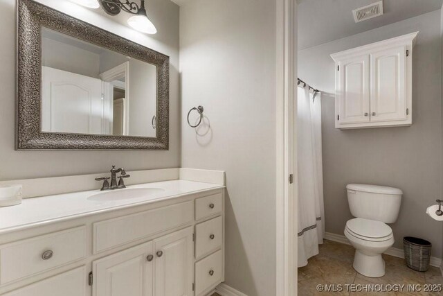9402 E 109th St S, Tulsa, OK 74133 - bathroom with vanity and tile patterned flooring