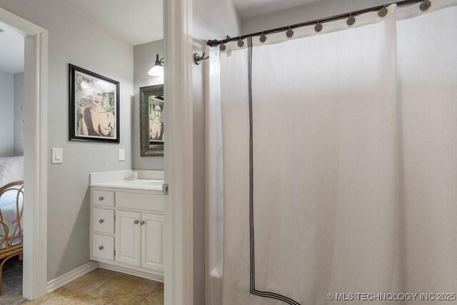 9402 E 109th St S, Tulsa, OK 74133 - full bath with vanity, tile patterned floors, and curtained shower