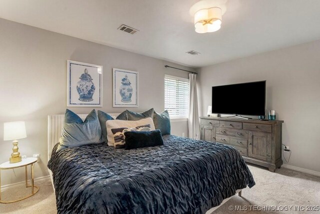 9402 E 109th St S, Tulsa, OK 74133 - bedroom featuring light carpet and baseboards