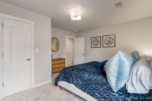 9402 E 109th St S, Tulsa, OK 74133 - carpeted bedroom with baseboards