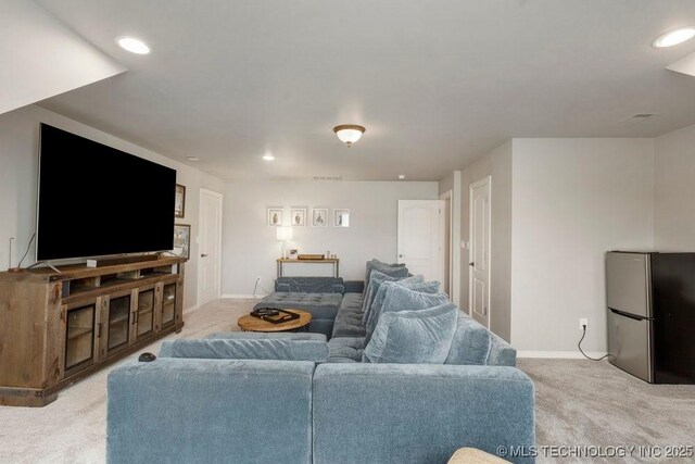 9402 E 109th St S, Tulsa, OK 74133 - living area with light colored carpet and recessed lighting