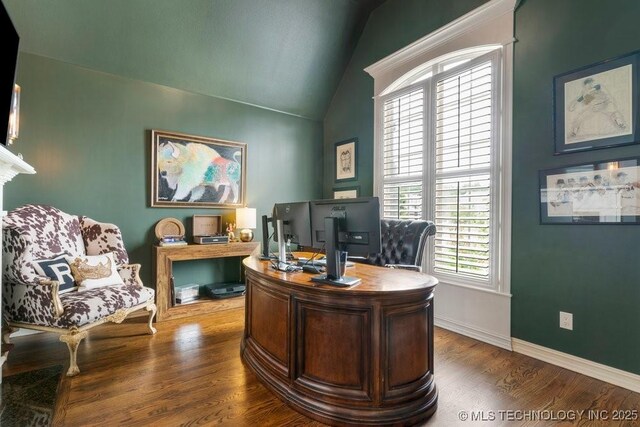 9402 E 109th St S, Tulsa, OK 74133 - home office with plenty of natural light, vaulted ceiling, and wood finished floors