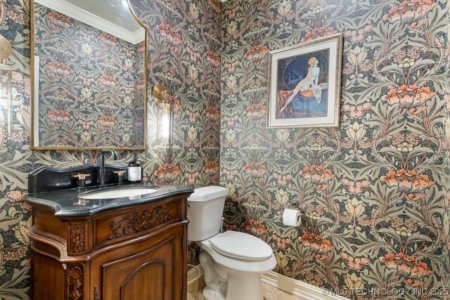 9402 E 109th St S, Tulsa, OK 74133 - half bathroom with wallpapered walls, ornamental molding, and vanity
