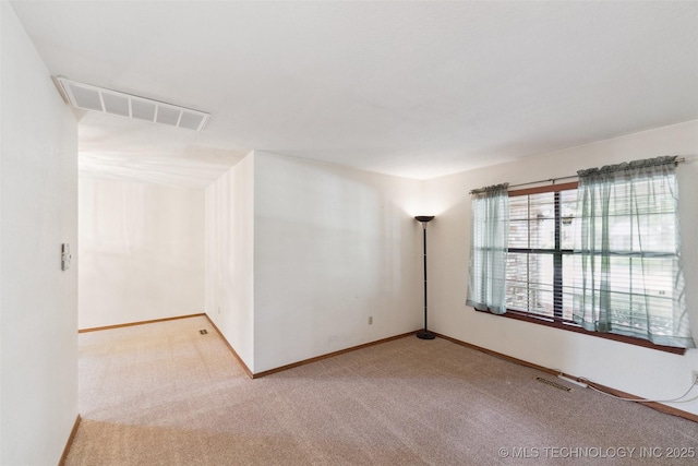 312 W Raleigh Pl, Broken Arrow, OK 74011 - carpeted spare room featuring baseboards