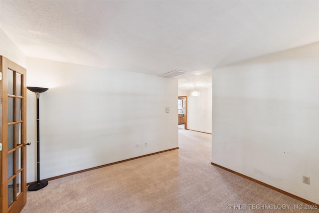312 W Raleigh Pl, Broken Arrow, OK 74011 - carpeted spare room with baseboards